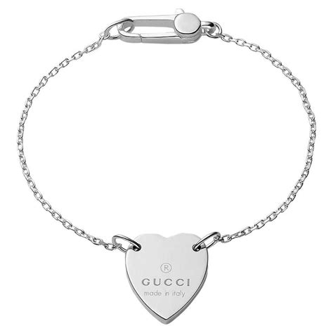 bracciale gucci con cuore prezzo|Bracciali Gucci: argento rigidi, a catena, smaltati e con pendente.